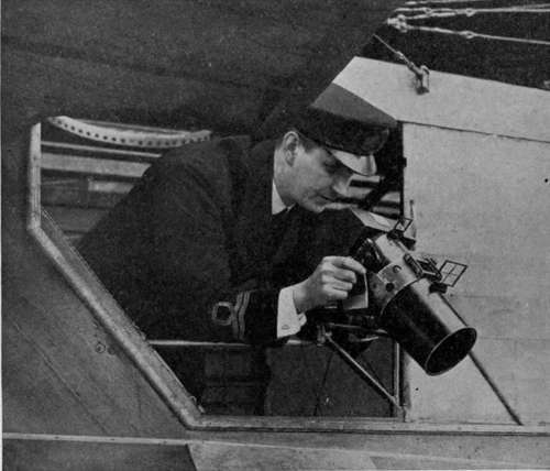 English Type 18 hand camera on bracket for exposing through side window of flying boat.