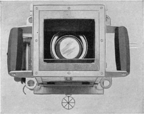Front view of U. S. aerial hand camera, showing lens flaps partly open, and details of tube sight.