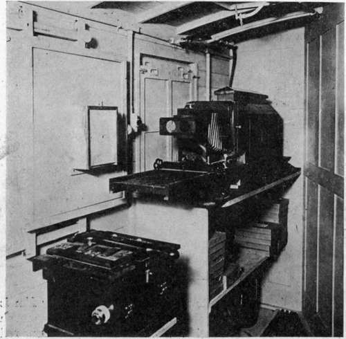 Interior of photographia trailer. nlarging camra and printer.