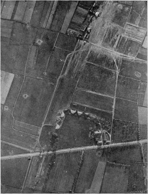 Aviation field, showing hangars, planes, landing T and refuge trench.