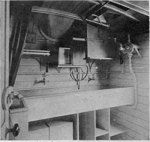 Interior of photographic trailer, developing room.