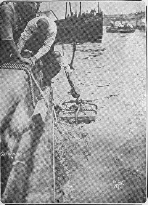 packing case containing six hundred pounds of iron weights and Houdini