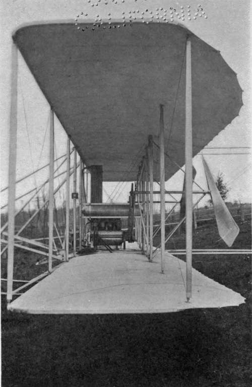 A glimpse through a Wright biplane.